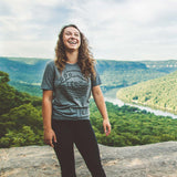 Hiker wearing Tenn Badge t-shirt at Snoopers Rock in the Prentice Cooper State Forest